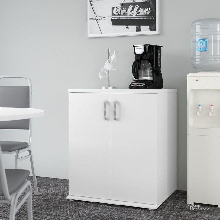 The appearance of Bush Business Furniture Universal Floor Storage Cabinet With Doors And Shelves In White designed by Bush Furniture in the modern / contemporary interior design. This white piece of furniture  was selected by 1StopBedrooms from Universal Collection to add a touch of cosiness and style into your home. Sku: UNS128WH. Product Type: Storage Cabinet. Image1