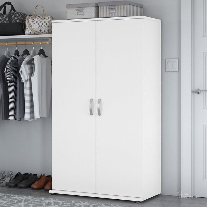 The appearance of Bush Business Furniture Universal Tall Clothing Storage Cabinet with Doors and Shelves in White designed by Bush Furniture in the modern / contemporary interior design. This white piece of furniture  was selected by 1StopBedrooms from Closet Storage Collection to add a touch of cosiness and style into your home. Sku: CLS136WH-Z. Material: Wood. Product Type: Storage Cabinet. Image1