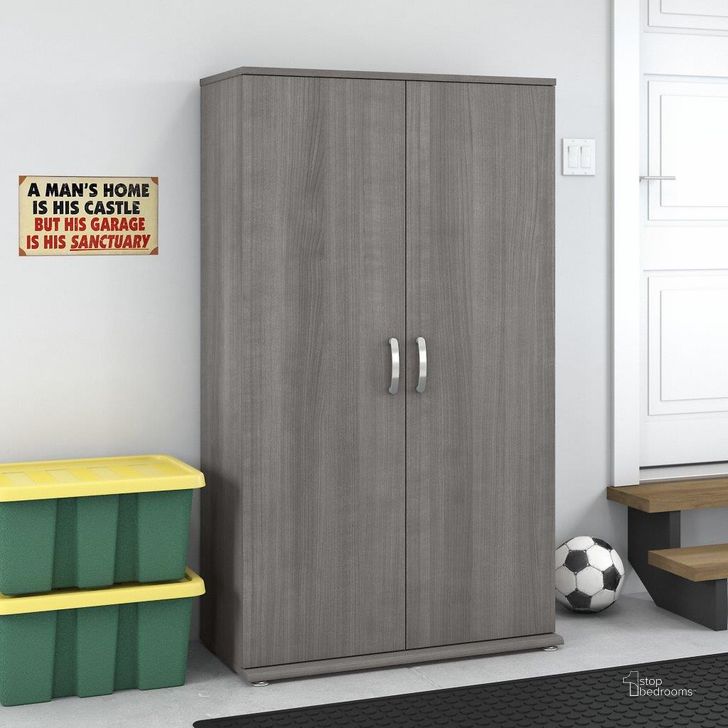 The appearance of Bush Business Furniture Universal Tall Garage Storage Cabinet with Doors and Shelves in Platinum Gray designed by Bush Furniture in the modern / contemporary interior design. This gray piece of furniture  was selected by 1StopBedrooms from Garage Storage Collection to add a touch of cosiness and style into your home. Sku: GAS136PG-Z. Material: Wood. Product Type: Storage Cabinet. Image1