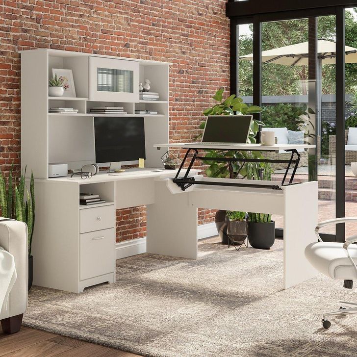 The appearance of Bush Furniture Cabot 60W 3 Position Sit To Stand L Shaped Desk with Hutch in White designed by Bush Furniture in the modern / contemporary interior design. This white piece of furniture  was selected by 1StopBedrooms from Cabot Collection to add a touch of cosiness and style into your home. Sku: CAB045WHN. Material: Wood. Product Type: Desk & Hutch. Image1