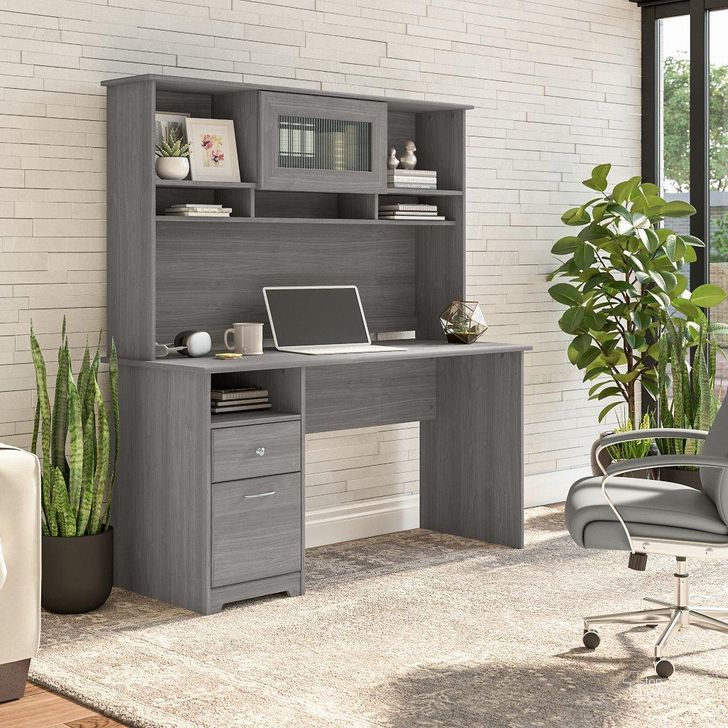 The appearance of Bush Furniture Cabot 60W Computer Desk with Hutch in Modern Gray designed by Bush Furniture in the modern / contemporary interior design. This gray piece of furniture  was selected by 1StopBedrooms from Cabot Collection to add a touch of cosiness and style into your home. Sku: CAB042MG. Material: Wood. Product Type: Computer Desk. Image1