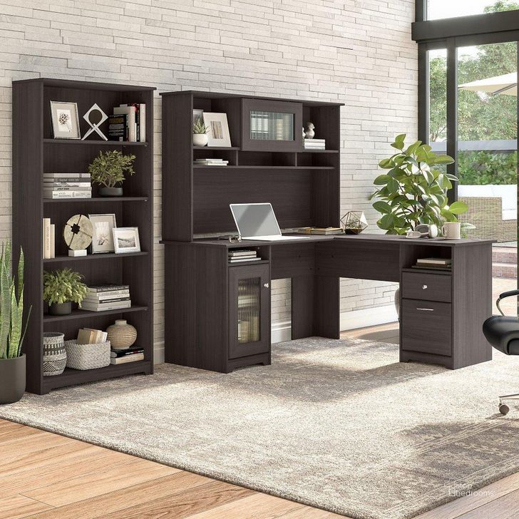 The appearance of Bush Furniture Cabot 60W L Shaped Computer Desk with Hutch and 5 Shelf Bookcase in Heather Gray designed by Bush Furniture in the modern / contemporary interior design. This grey heather piece of furniture  was selected by 1StopBedrooms from Cabot Collection to add a touch of cosiness and style into your home. Sku: CAB011HRG. Material: Wood. Product Type: Computer Desk. Image1
