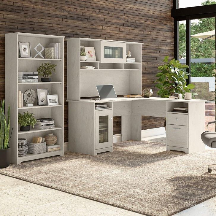 The appearance of Bush Furniture Cabot 60W L Shaped Computer Desk with Hutch and 5 Shelf Bookcase in Linen White Oak designed by Bush Furniture in the modern / contemporary interior design. This oak and white piece of furniture  was selected by 1StopBedrooms from Cabot Collection to add a touch of cosiness and style into your home. Sku: CAB011LW. Material: Wood. Product Type: Computer Desk. Image1