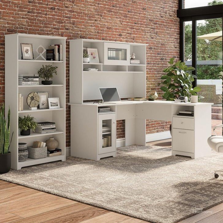 The appearance of Bush Furniture Cabot 60W L Shaped Computer Desk with Hutch and 5 Shelf Bookcase in White designed by Bush Furniture in the modern / contemporary interior design. This white piece of furniture  was selected by 1StopBedrooms from Cabot Collection to add a touch of cosiness and style into your home. Sku: CAB011WHN. Material: Wood. Product Type: Computer Desk. Image1