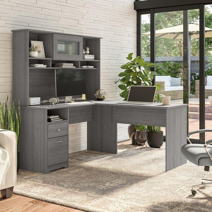 The appearance of Bush Furniture Cabot 60W L Shaped Computer Desk with Hutch and Drawers in Modern Gray designed by Bush Furniture in the modern / contemporary interior design. This gray piece of furniture  was selected by 1StopBedrooms from Cabot Collection to add a touch of cosiness and style into your home. Sku: CAB046MG. Material: Wood. Product Type: Computer Desk. Image1