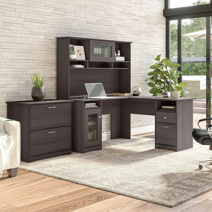 The appearance of Bush Furniture Cabot 60W L Shaped Computer Desk with Hutch and Lateral File Cabinet in Heather Gray designed by Bush Furniture in the modern / contemporary interior design. This grey heather piece of furniture  was selected by 1StopBedrooms from Cabot Collection to add a touch of cosiness and style into your home. Sku: CAB005HRG. Material: Wood. Product Type: Computer Desk. Image1