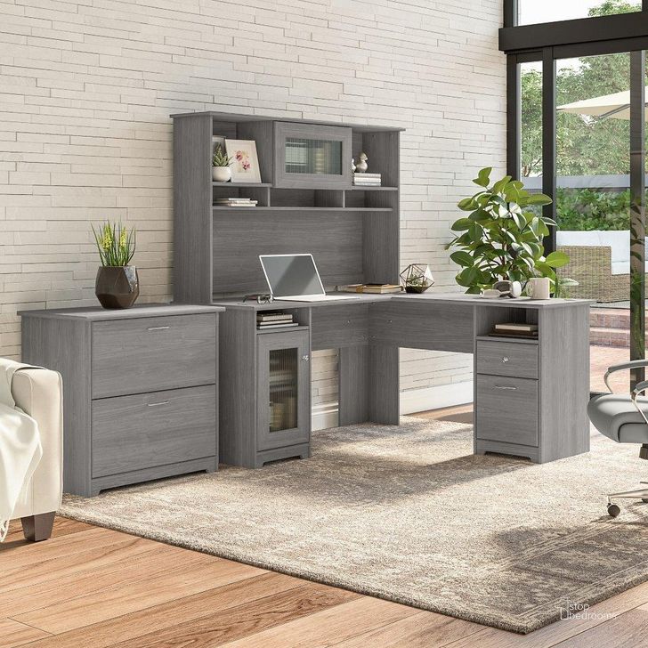 The appearance of Bush Furniture Cabot 60W L Shaped Computer Desk with Hutch and Lateral File Cabinet in Modern Gray designed by Bush Furniture in the modern / contemporary interior design. This gray piece of furniture  was selected by 1StopBedrooms from Cabot Collection to add a touch of cosiness and style into your home. Sku: CAB005MG. Material: Wood. Product Type: Computer Desk. Image1