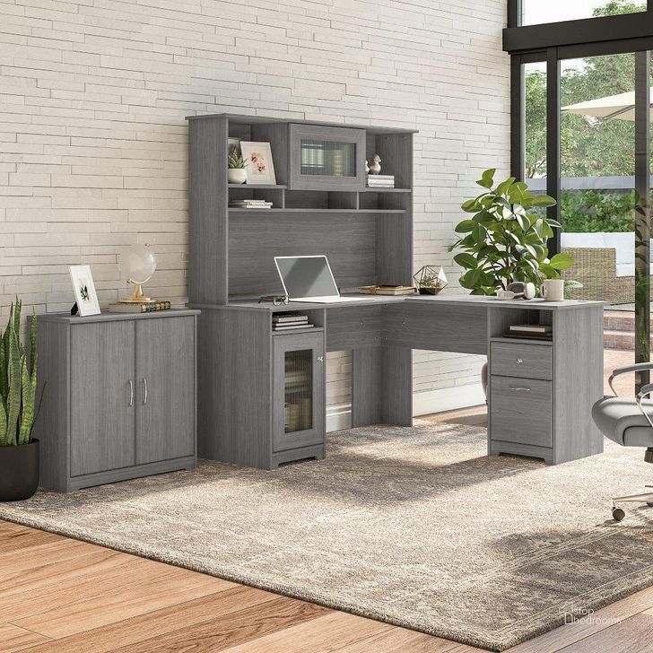 The appearance of Bush Furniture Cabot 60W L Shaped Computer Desk with Hutch and Small Storage Cabinet in Modern Gray designed by Bush Furniture in the modern / contemporary interior design. This gray piece of furniture  was selected by 1StopBedrooms from Cabot Collection to add a touch of cosiness and style into your home. Sku: CAB016MG. Material: Wood. Product Type: Computer Desk. Image1
