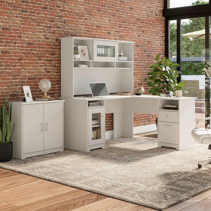 The appearance of Bush Furniture Cabot 60W L Shaped Computer Desk with Hutch and Small Storage Cabinet in White designed by Bush Furniture in the modern / contemporary interior design. This white piece of furniture  was selected by 1StopBedrooms from Cabot Collection to add a touch of cosiness and style into your home. Sku: CAB016WHN. Material: Wood. Product Type: Computer Desk. Image1