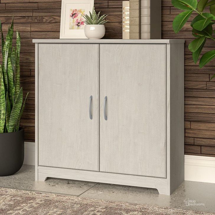 The appearance of Bush Furniture Cabot Small Storage Cabinet with Doors in Linen White Oak Wc31198 designed by Bush Furniture in the modern / contemporary interior design. This oak and white piece of furniture  was selected by 1StopBedrooms from Cabot Collection to add a touch of cosiness and style into your home. Sku: WC31198. Product Type: Storage Cabinet. Image1
