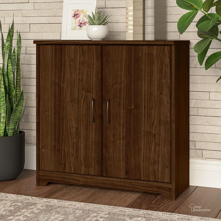 The appearance of Bush Furniture Cabot Small Storage Cabinet with Doors in Modern Walnut designed by Bush Furniture in the modern / contemporary interior design. This modern walnut piece of furniture  was selected by 1StopBedrooms from Cabot Collection to add a touch of cosiness and style into your home. Sku: WC31098. Product Type: Storage Cabinet. Image1