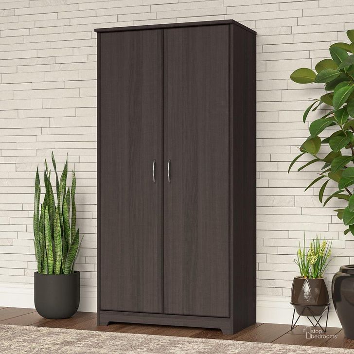 The appearance of Bush Furniture Cabot Tall Storage Cabinet with Doors in Heather Gray designed by Bush Furniture in the modern / contemporary interior design. This grey heather piece of furniture  was selected by 1StopBedrooms from Cabot Collection to add a touch of cosiness and style into your home. Sku: WC31799. Product Type: Storage Cabinet. Image1