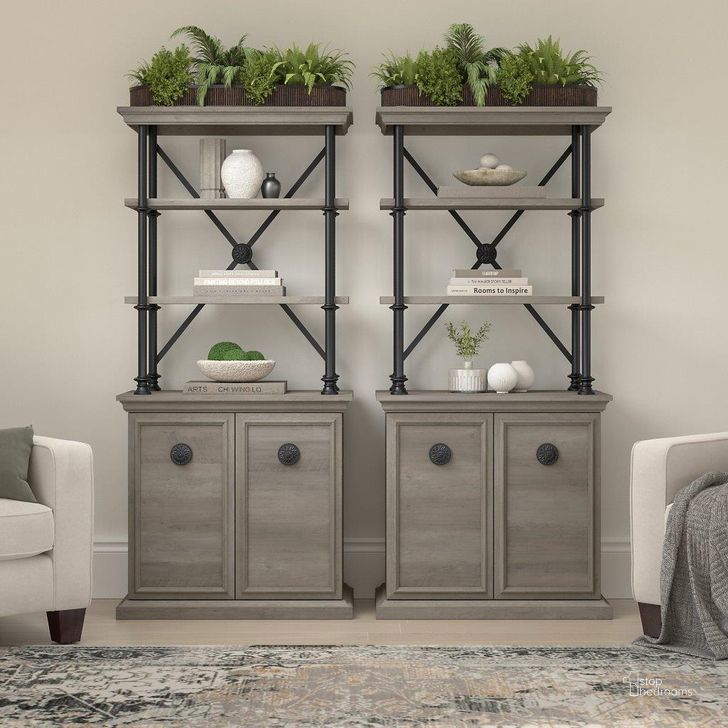 The appearance of Bush Furniture Coliseum Designer Bookcase with Doors (Set of 2) in Driftwood Gray designed by Bush Furniture in the country / farmhouse interior design. This gray piece of furniture  was selected by 1StopBedrooms from Coliseum Collection to add a touch of cosiness and style into your home. Sku: CSM005DG. Material: Wood. Product Type: Bookcase. Image1