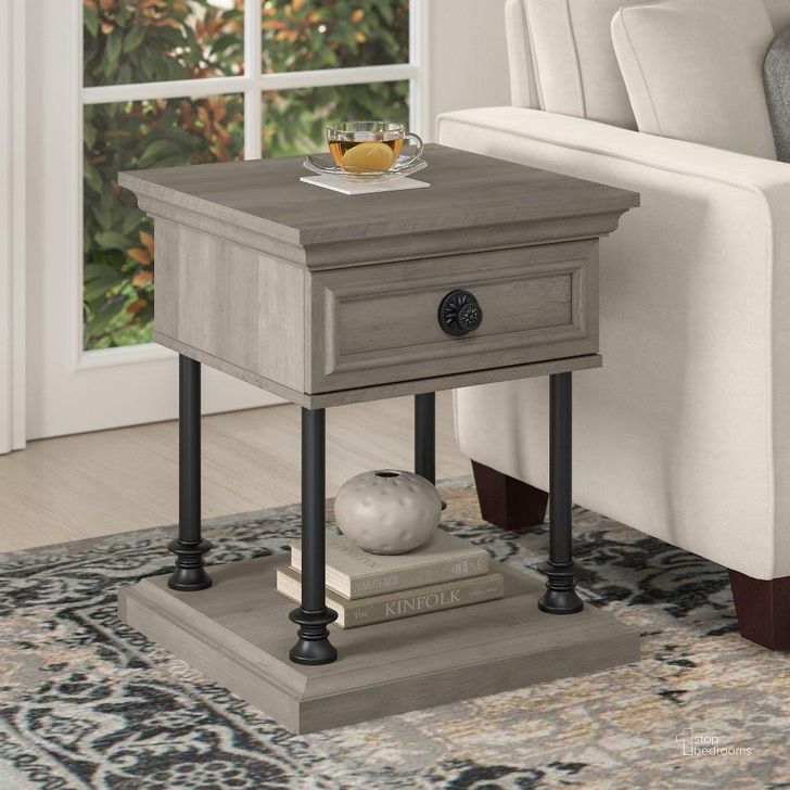 The appearance of Bush Furniture Coliseum Designer End Table with Storage in Driftwood Gray designed by Bush Furniture in the country / farmhouse interior design. This gray piece of furniture  was selected by 1StopBedrooms from Coliseum Collection to add a touch of cosiness and style into your home. Sku: CST120DG-03. Material: Wood. Product Type: End Table. Image1