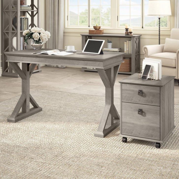 The appearance of Bush Furniture Homestead 48W Farmhouse Writing Desk with Mobile File Cabinet in Driftwood Gray designed by Bush Furniture in the country / farmhouse interior design. This gray piece of furniture  was selected by 1StopBedrooms from Homestead Collection to add a touch of cosiness and style into your home. Sku: HOT001DG. Material: Wood. Product Type: Writing Desk. Image1