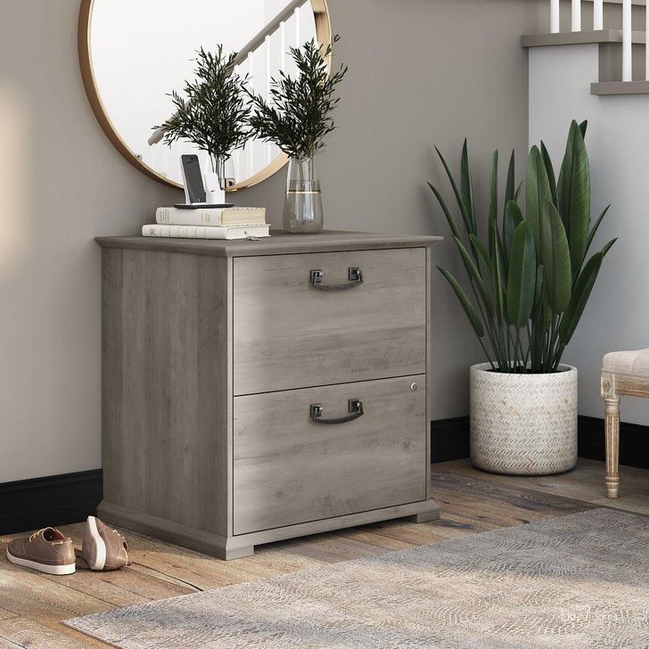 The appearance of Bush Furniture Homestead Farmhouse 2 Drawer Accent Cabinet in Driftwood Gray designed by Bush Furniture in the country / farmhouse interior design. This gray piece of furniture  was selected by 1StopBedrooms from Homestead Collection to add a touch of cosiness and style into your home. Sku: HOF129DG-Z. Material: Wood. Product Type: Accent Cabinet. Image1