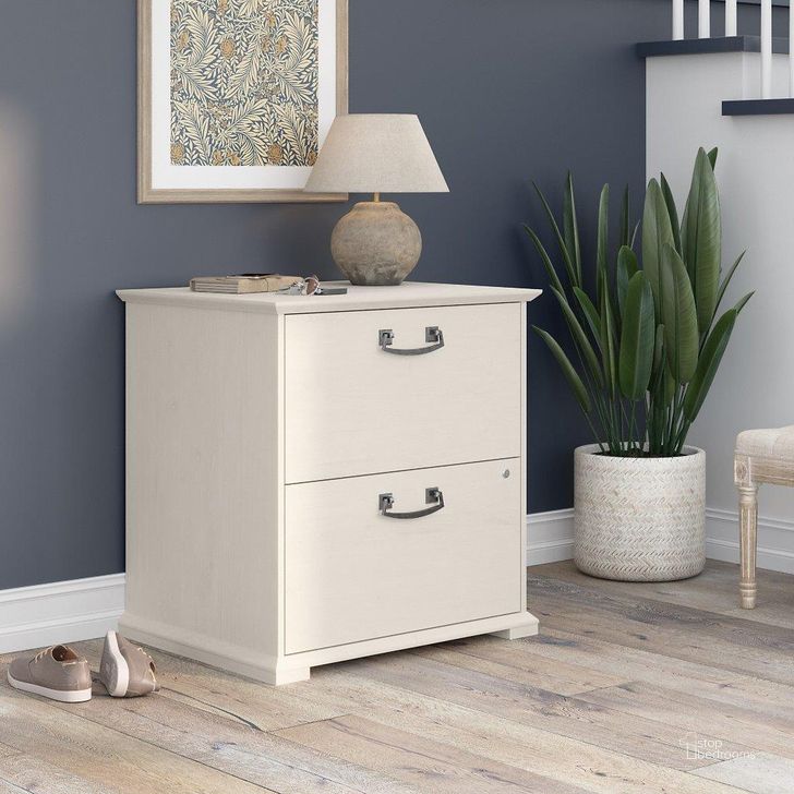 The appearance of Bush Furniture Homestead Farmhouse 2 Drawer Accent Cabinet in Linen White Oak designed by Bush Furniture in the country / farmhouse interior design. This oak and white piece of furniture  was selected by 1StopBedrooms from Homestead Collection to add a touch of cosiness and style into your home. Sku: HOF129LW-Z. Material: Wood. Product Type: Accent Cabinet. Image1