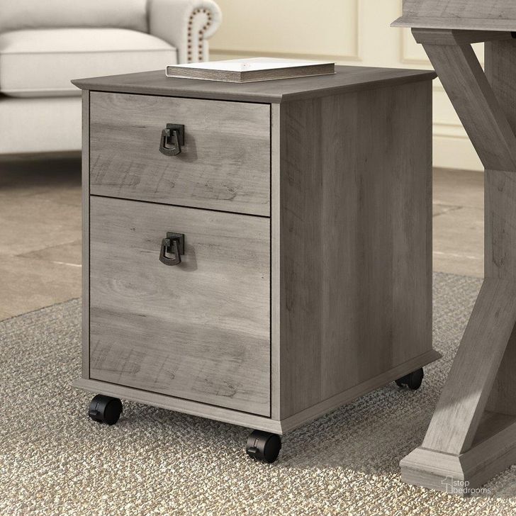 The appearance of Bush Furniture Homestead Farmhouse Mobile Cabinet in Driftwood Gray designed by Bush Furniture in the country / farmhouse interior design. This gray piece of furniture  was selected by 1StopBedrooms from Homestead Collection to add a touch of cosiness and style into your home. Sku: HOF117DG-03. Material: Wood. Product Type: Mobile Filing Cabinet. Image1