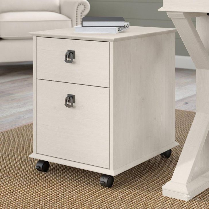 The appearance of Bush Furniture Homestead Farmhouse Mobile File Cabinet in Linen White Oak designed by Bush Furniture in the country / farmhouse interior design. This oak and white piece of furniture  was selected by 1StopBedrooms from Homestead Collection to add a touch of cosiness and style into your home. Sku: HOF117LW-03. Material: Wood. Product Type: Mobile Filing Cabinet. Image1