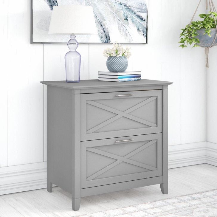 The appearance of Bush Furniture Key West 2 Drawer Lateral File Cabinet In Cape Cod Gray designed by Bush Furniture in the country / farmhouse interior design. This gray piece of furniture  was selected by 1StopBedrooms from Key West Collection to add a touch of cosiness and style into your home. Sku: KWF130CG-03. Product Type: File Cabinet. Image1