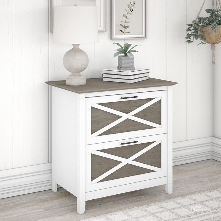 The appearance of Bush Furniture Key West 2 Drawer Lateral File Cabinet In Pure White And Shiplap Gray designed by Bush Furniture in the country / farmhouse interior design. This white and gray piece of furniture  was selected by 1StopBedrooms from Key West Collection to add a touch of cosiness and style into your home. Sku: KWF130G2W-03. Product Type: File Cabinet. Image1