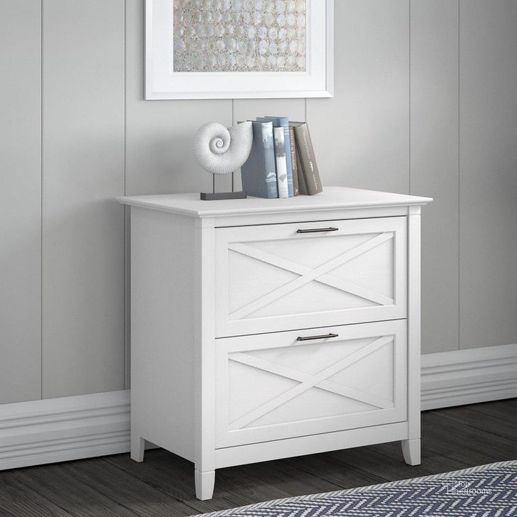 The appearance of Bush Furniture Key West 2 Drawer Lateral File Cabinet In Pure White Oak designed by Bush Furniture in the country / farmhouse interior design. This white piece of furniture  was selected by 1StopBedrooms from Key West Collection to add a touch of cosiness and style into your home. Sku: KWF130WT-03. Product Type: File Cabinet. Image1
