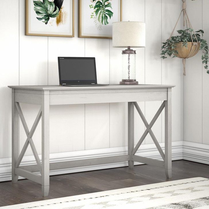 The appearance of Bush Furniture Key West 48W Writing Desk In Linen White Oak designed by Bush Furniture in the country / farmhouse interior design. This linen white piece of furniture  was selected by 1StopBedrooms from Key West Collection to add a touch of cosiness and style into your home. Sku: KWD148LW-03. Product Type: Writing Desk. Image1