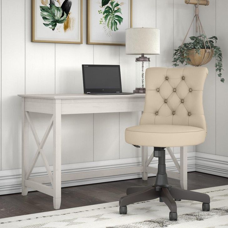 The appearance of Bush Furniture Key West 48W Writing Desk with Mid Back Tufted Office Chair in Linen White Oak designed by Bush Furniture in the country / farmhouse interior design. This linen white piece of furniture  was selected by 1StopBedrooms from Key West Collection to add a touch of cosiness and style into your home. Sku: KWS021LW. Material: Wood. Product Type: Home Office Set. Image1