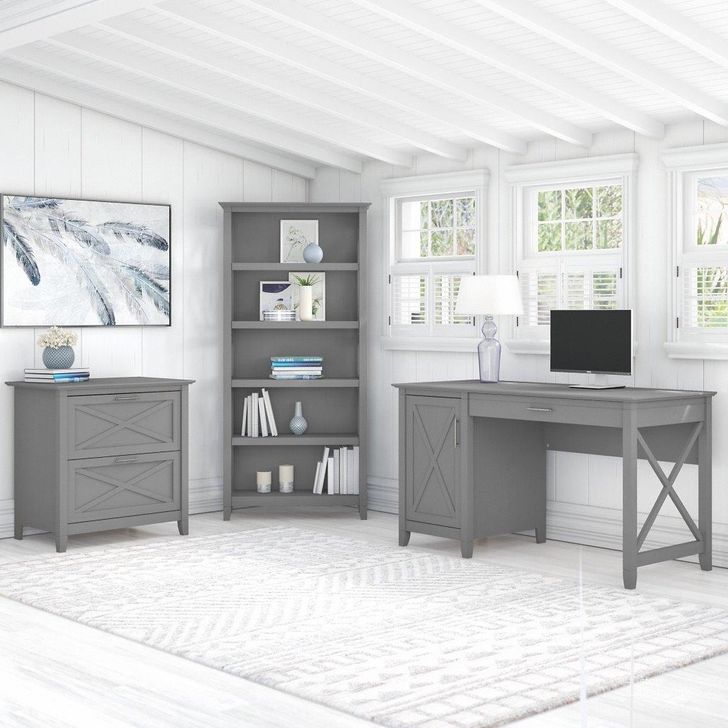 The appearance of Bush Furniture Key West 54W Computer Desk With 2 Drawer Lateral File Cabinet And 5 Shelf Bookcase In Cape Cod Gray designed by Bush Furniture in the country / farmhouse interior design. This gray piece of furniture  was selected by 1StopBedrooms from Key West Collection to add a touch of cosiness and style into your home. Sku: KWS009CG. Product Type: Home Office Desk. Image1
