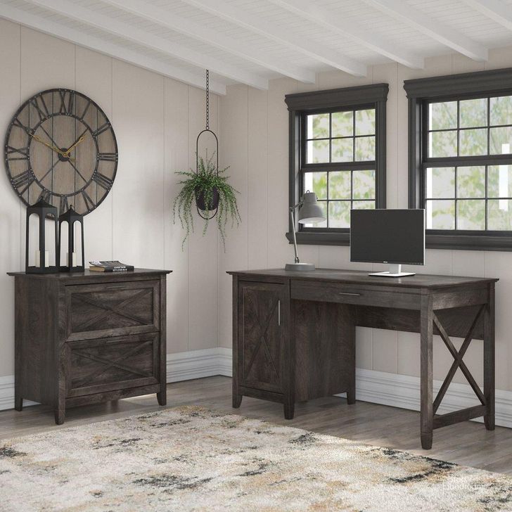 The appearance of Bush Furniture Key West 54W Computer Desk With Storage And 2 Drawer Lateral File Cabinet In Dark Gray Hickory designed by Bush Furniture in the country / farmhouse interior design. This dark gray piece of furniture  was selected by 1StopBedrooms from Key West Collection to add a touch of cosiness and style into your home. Sku: KWS008GH. Product Type: Home Office Desk. Image1