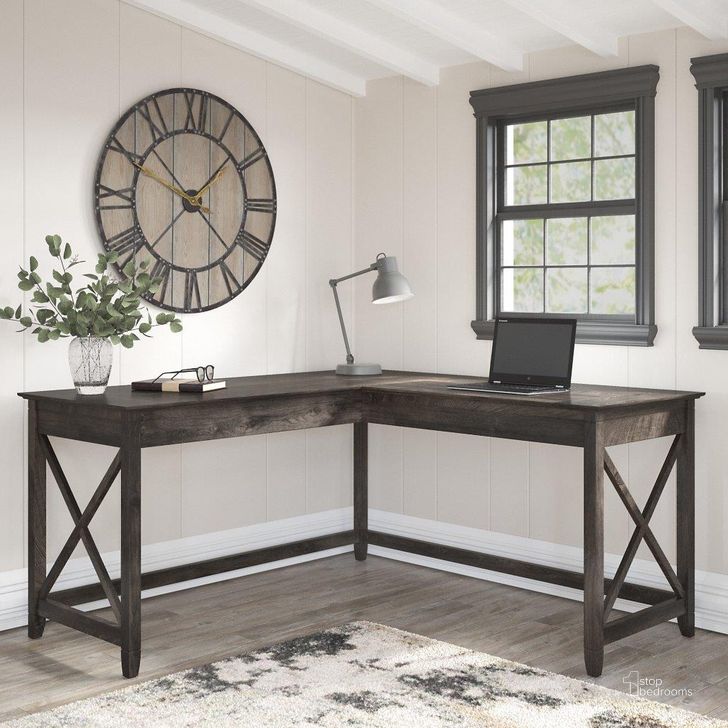 The appearance of Bush Furniture Key West 60W L Shaped Desk In Dark Gray Hickory designed by Bush Furniture in the country / farmhouse interior design. This dark gray piece of furniture  was selected by 1StopBedrooms from Key West Collection to add a touch of cosiness and style into your home. Sku: KWD160GH-03. Product Type: Desk. Image1