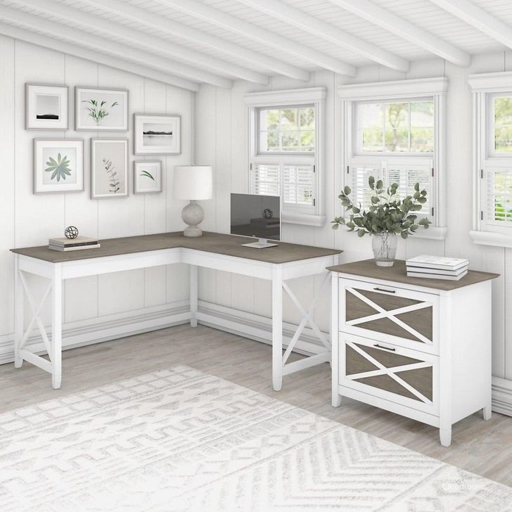 The appearance of Bush Furniture Key West 60W L Shaped Desk With 2 Drawer Lateral File Cabinet In Pure White And Shiplap Gray designed by Bush Furniture in the country / farmhouse interior design. This white and gray piece of furniture  was selected by 1StopBedrooms from Key West Collection to add a touch of cosiness and style into your home. Sku: KWS014G2W. Product Type: Home Office Desk. Image1