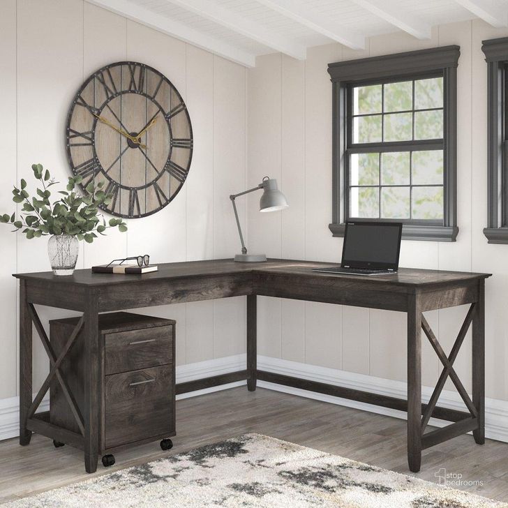 The appearance of Bush Furniture Key West 60W L Shaped Desk With 2 Drawer Mobile File Cabinet In Dark Gray Hickory designed by Bush Furniture in the country / farmhouse interior design. This dark gray piece of furniture  was selected by 1StopBedrooms from Key West Collection to add a touch of cosiness and style into your home. Sku: KWS013GH. Product Type: Home Office Desk. Image1