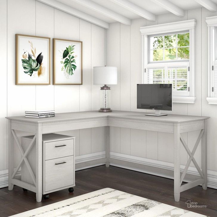The appearance of Bush Furniture Key West 60W L Shaped Desk With 2 Drawer Mobile File Cabinet In Linen White Oak designed by Bush Furniture in the country / farmhouse interior design. This linen white piece of furniture  was selected by 1StopBedrooms from Key West Collection to add a touch of cosiness and style into your home. Sku: KWS013LW. Product Type: Home Office Desk. Image1