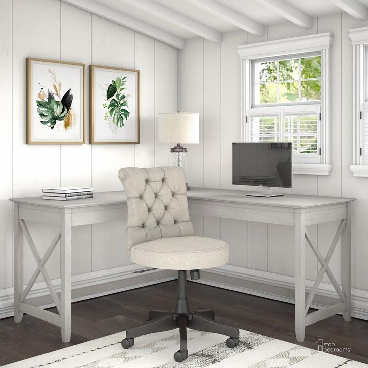 The appearance of Bush Furniture Key West 60W L Shaped Desk with Mid Back Tufted Office Chair in Linen White Oak designed by Bush Furniture in the country / farmhouse interior design. This linen white piece of furniture  was selected by 1StopBedrooms from Key West Collection to add a touch of cosiness and style into your home. Sku: KWS045LW. Material: Wood. Product Type: Home Office Set. Image1
