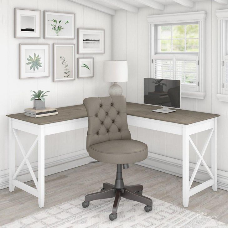 The appearance of Bush Furniture Key West 60W L Shaped Desk with Mid Back Tufted Office Chair in Pure White and Shiplap Gray designed by Bush Furniture in the country / farmhouse interior design. This gray and white piece of furniture  was selected by 1StopBedrooms from Key West Collection to add a touch of cosiness and style into your home. Sku: KWS045G2W. Material: Wood. Product Type: Home Office Set. Image1