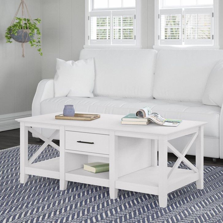 The appearance of Bush Furniture Key West Coffee Table With Storage In Pure White Oak designed by Bush Furniture in the country / farmhouse interior design. This white piece of furniture  was selected by 1StopBedrooms from Key West Collection to add a touch of cosiness and style into your home. Sku: KWT148WT-03. Product Type: Coffee Table. Image1