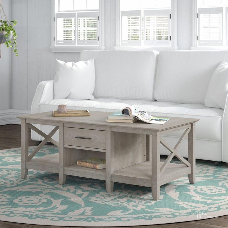 The appearance of Bush Furniture Key West Coffee Table with Storage in Washed Gray designed by Bush Furniture in the country / farmhouse interior design. This washed grey piece of furniture  was selected by 1StopBedrooms from Key West Collection to add a touch of cosiness and style into your home. Sku: KWT148WG-03. Product Type: Coffee Table. Image1
