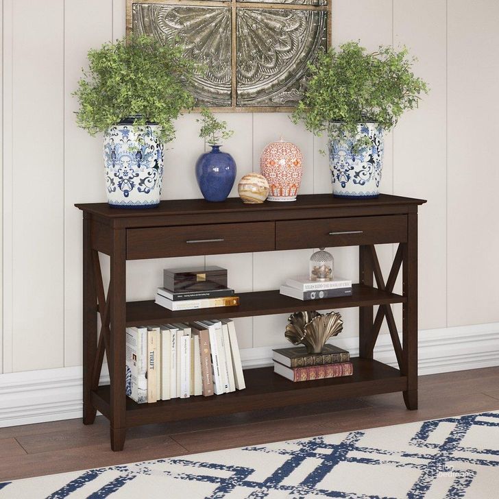 The appearance of Bush Furniture Key West Console Table With Drawers And Shelves In Bing Cherry designed by Bush Furniture in the country / farmhouse interior design. This cherry piece of furniture  was selected by 1StopBedrooms from Key West Collection to add a touch of cosiness and style into your home. Sku: KWT248BC-03. Product Type: Console Table. Image1