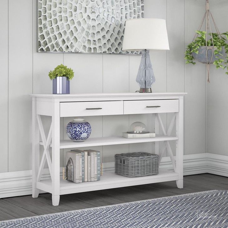 The appearance of Bush Furniture Key West Console Table With Drawers And Shelves In Pure White Oak designed by Bush Furniture in the country / farmhouse interior design. This white piece of furniture  was selected by 1StopBedrooms from Key West Collection to add a touch of cosiness and style into your home. Sku: KWT248WT-03. Product Type: Console Table. Image1