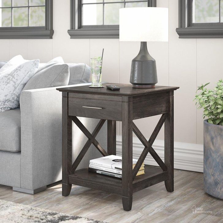 The appearance of Bush Furniture Key West End Table With Storage In Dark Gray Hickory designed by Bush Furniture in the country / farmhouse interior design. This dark gray piece of furniture  was selected by 1StopBedrooms from Key West Collection to add a touch of cosiness and style into your home. Sku: KWT120GH-03. Product Type: End Table. Image1