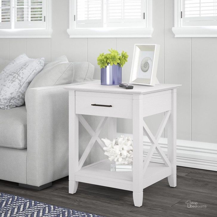 The appearance of Bush Furniture Key West End Table With Storage In Pure White Oak designed by Bush Furniture in the country / farmhouse interior design. This white piece of furniture  was selected by 1StopBedrooms from Key West Collection to add a touch of cosiness and style into your home. Sku: KWT120WT-03. Product Type: End Table. Image1
