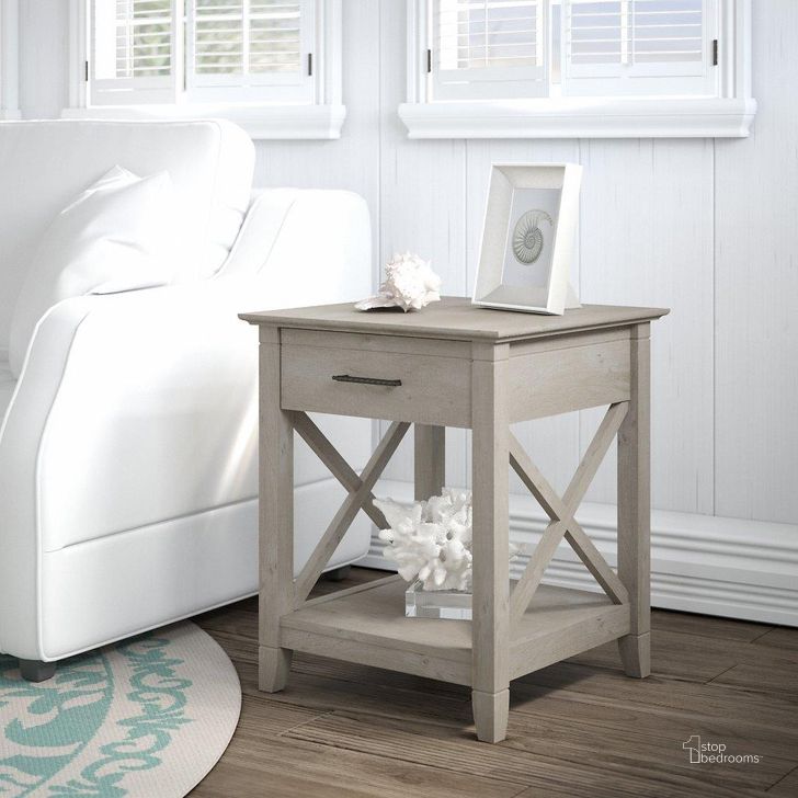 The appearance of Bush Furniture Key West End Table with Storage in Washed Gray designed by Bush Furniture in the country / farmhouse interior design. This washed grey piece of furniture  was selected by 1StopBedrooms from Key West Collection to add a touch of cosiness and style into your home. Sku: KWT120WG-03. Product Type: End Table. Image1