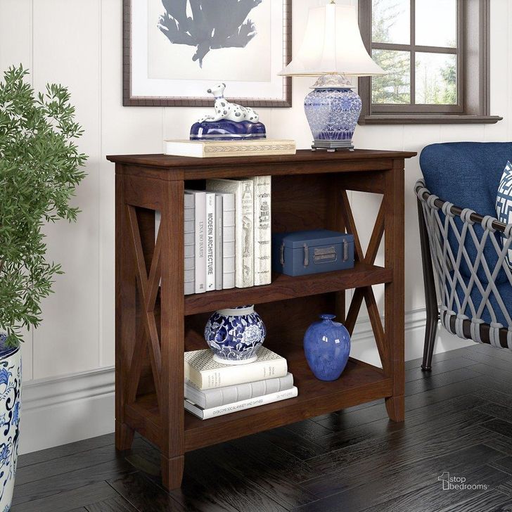 The appearance of Bush Furniture Key West Small 2 Shelf Bookcase In Bing Cherry designed by Bush Furniture in the country / farmhouse interior design. This cherry piece of furniture  was selected by 1StopBedrooms from Key West Collection to add a touch of cosiness and style into your home. Sku: KWB124BC-03. Product Type: Bookcase. Image1