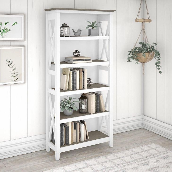 The appearance of Bush Furniture Key West Tall 5 Shelf Bookcase In Pure White And Shiplap Gray designed by Bush Furniture in the country / farmhouse interior design. This white and gray piece of furniture  was selected by 1StopBedrooms from Key West Collection to add a touch of cosiness and style into your home. Sku: KWB132G2W-03. Product Type: Bookcase. Image1