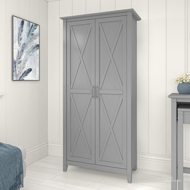 The appearance of Bush Furniture Key West Tall Storage Cabinet With Doors In Cape Cod Gray designed by Bush Furniture in the country / farmhouse interior design. This gray piece of furniture  was selected by 1StopBedrooms from Key West Collection to add a touch of cosiness and style into your home. Sku: KWS266CG-03. Product Type: Storage Cabinet. Image1