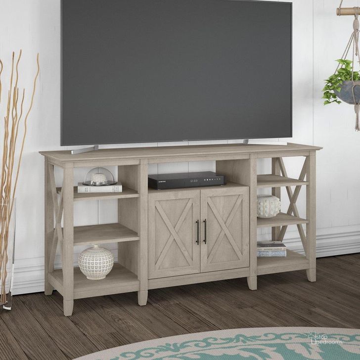 The appearance of Bush Furniture Key West Tall Tv Stand For 65 Inch Tv in Washed Gray designed by Bush Furniture in the country / farmhouse interior design. This washed grey piece of furniture  was selected by 1StopBedrooms from Key West Collection to add a touch of cosiness and style into your home. Sku: KWV160WG-03. Product Type: TV Stand. Image1