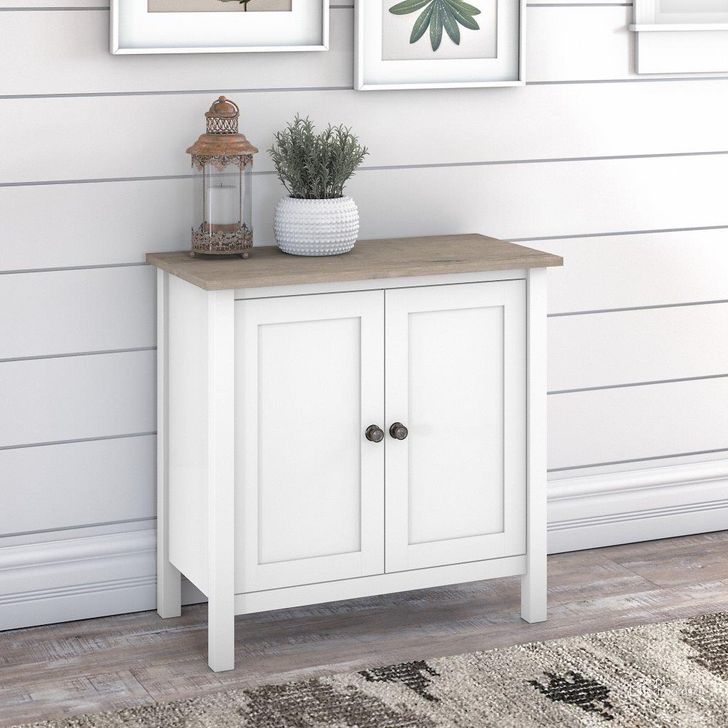 The appearance of Bush Furniture Mayfield Accent Storage Cabinet With Doors In Pure White And Shiplap Gray designed by Bush Furniture in the rustic / southwestern interior design. This gray and white piece of furniture  was selected by 1StopBedrooms from Mayfield Collection to add a touch of cosiness and style into your home. Sku: MAS131GW2-03. Material: Wood. Product Type: Filing Cabinets and Storage. Image1
