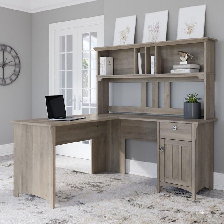 The appearance of Bush Furniture Salinas 60W L Shaped Desk with Hutch in Driftwood Gray designed by Bush Furniture in the country / farmhouse interior design. This driftwood piece of furniture  was selected by 1StopBedrooms from Salinas Collection to add a touch of cosiness and style into your home. Sku: SAL004DG. Product Type: Desk & Hutch. Image1