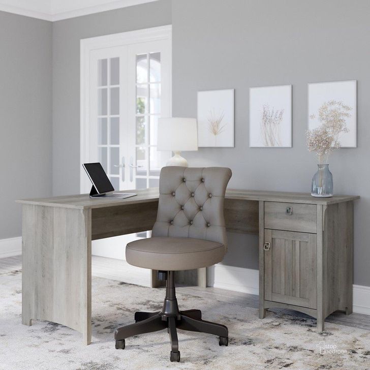 The appearance of Bush Furniture Salinas 60W L Shaped Desk with Mid Back Tufted Office Chair in Driftwood Gray designed by Bush Furniture in the country / farmhouse interior design. This driftwood piece of furniture  was selected by 1StopBedrooms from Salinas Collection to add a touch of cosiness and style into your home. Sku: SAL010DG. Product Type: Home Office Set. Image1